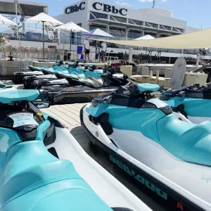 Marina Santa Eulalia Ibiza aerial view with jet skis and Mediterranean coastline